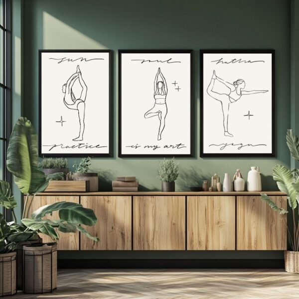 Three framed art prints featuring minimalist line drawings of yoga poses with text: 'Sun', 'Mud', and 'Hatha'.