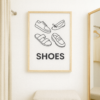 Illustration of four different types of shoes, including sneakers, flats, sandals, and loafers, with the word 'SHOES' below.