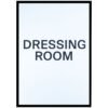 Framed print displaying the text 'DRESSING ROOM' in bold black letters on a light background.