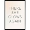 Framed wall art print with the text 'There She Glows Again' in a simple, modern font on a light background.