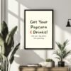 movie-art-prints-2-scaled-1.jpg Framed wall art with the text 'Get Your Popcorn & Drinks! make your day better than yesterday' in a modern design.
